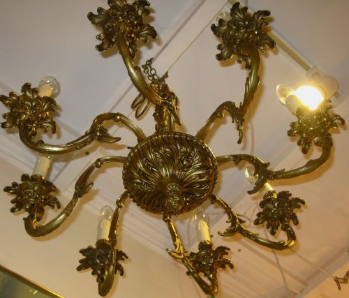 fig 1. AN EARLY 20THC EIGHT ARM BRASS CHANDELIER