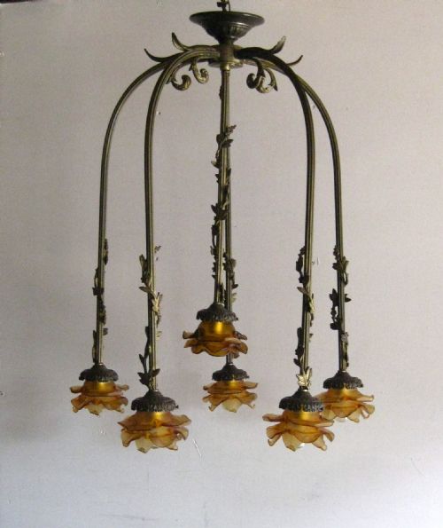 An Antique Ceiling Light with Amber Shades