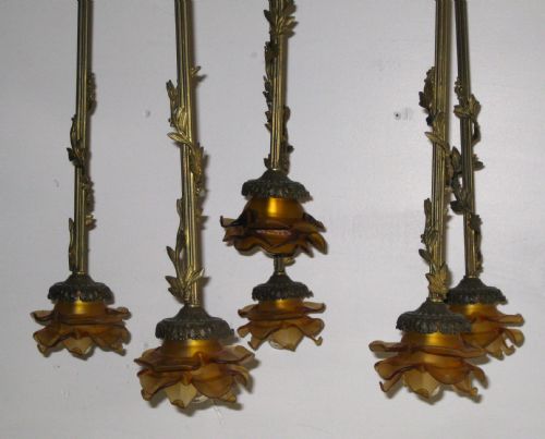 fig 1. AN ANTIQUE CEILING LIGHT WITH AMBER SHADES