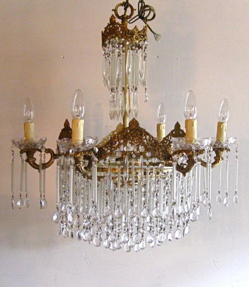 A  Brass  Chandelier with Long Frosted Glass Drops