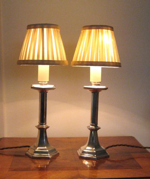 A Pair of Silver Plated Candle Lamps