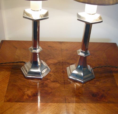 fig 1. A PAIR OF SILVER PLATED CANDLE LAMPS