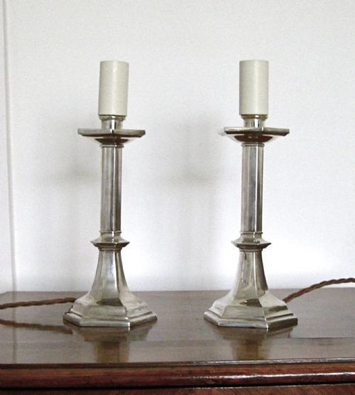 fig 2. A PAIR OF SILVER PLATED CANDLE LAMPS