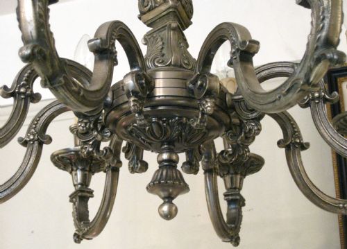 fig 1. AN ANTIQUE SILVER PLATED CHANDELIER