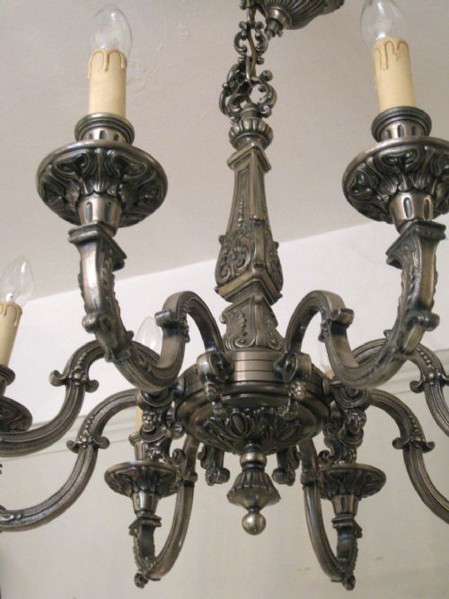 fig 2. AN ANTIQUE SILVER PLATED CHANDELIER