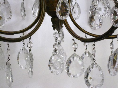 fig 1. AN EARLY 20TH CENTURY BRASS CHANDELIER