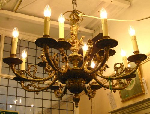 A Brass Chandelier with Cherubs