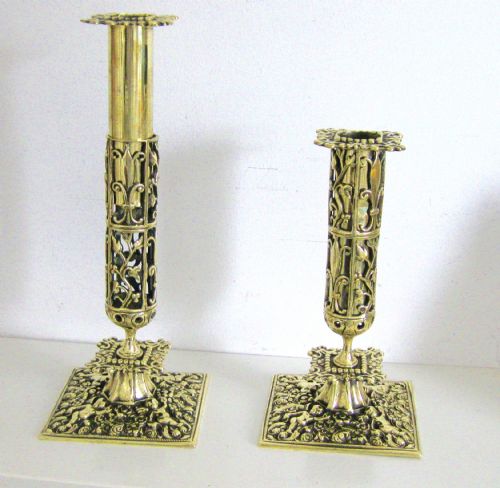 fig 1. A PAIR OF ORNATE BRASS CANDLESTICKS