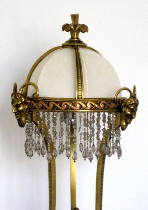 fig 2. A BRASS AND MARBLE LAMP WITH BEADED SHADE