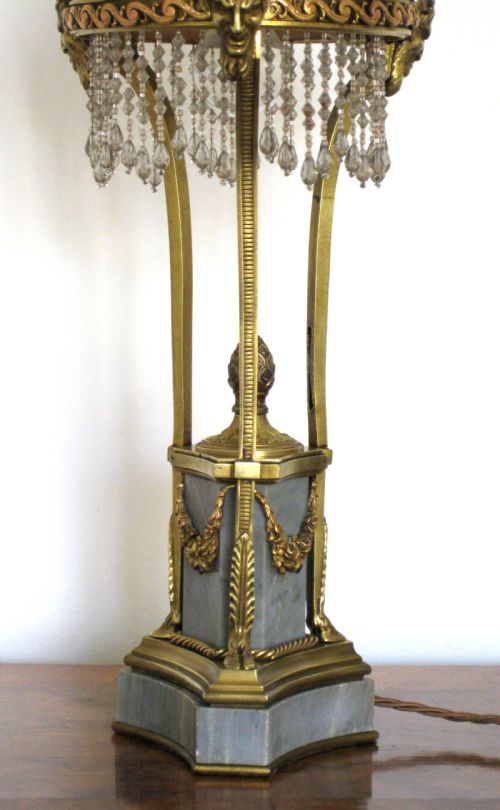 fig 3. A BRASS AND MARBLE LAMP WITH BEADED SHADE