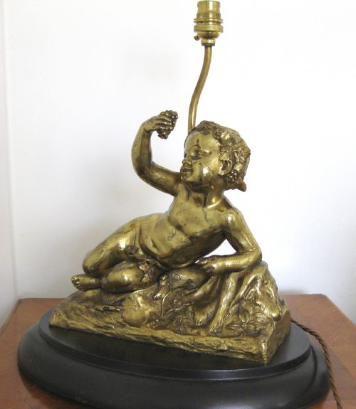 fig 3. A VICTORIAN GILDED BRONZE CHERUB LAMP