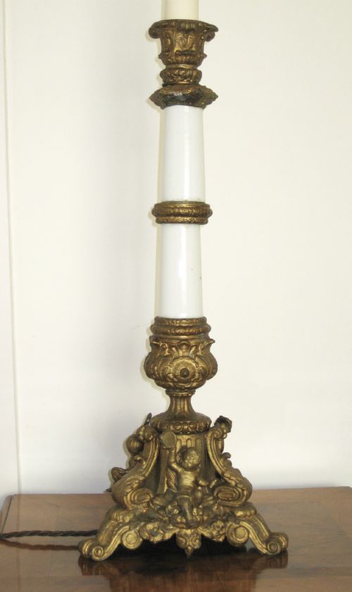 A Cherub Brass and Porcelain Lamp