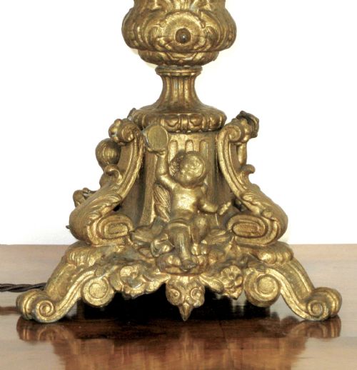 fig 1. A CHERUB BRASS AND PORCELAIN LAMP