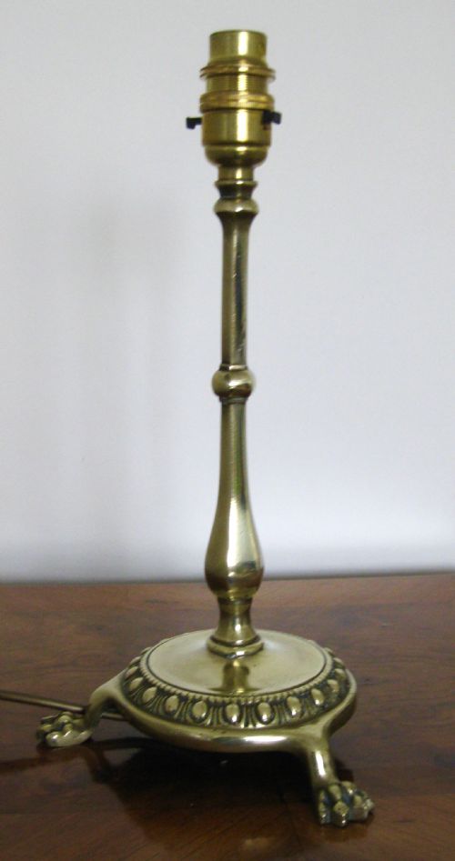 fig 1. EDWARDIAN BRASS LAMP WITH LIONS CLAW FEET