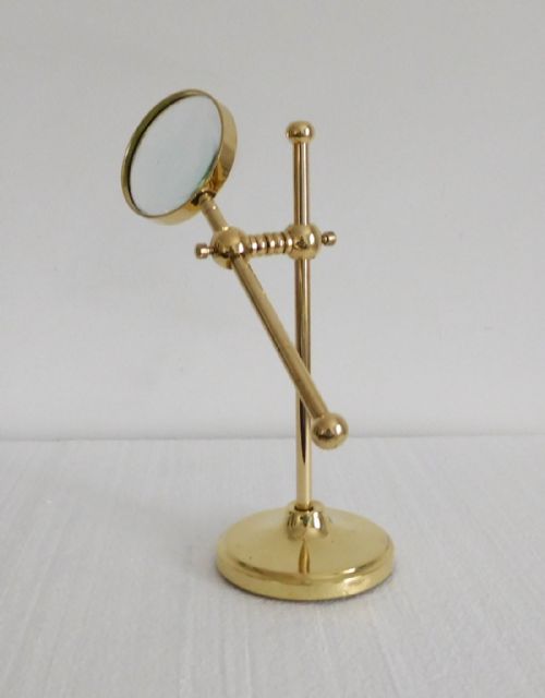 fig 1. ANTIQUE MAGNIFYING GLASS ON A STAND