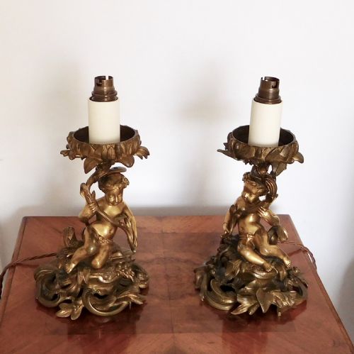 fig 2. A PAIR OF VICTORIAN GILDED BRONZE CHERUB LAMPS