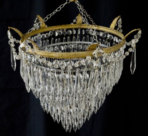 fig 1. A FIVE TIER GLASS DROP CHANDELIER