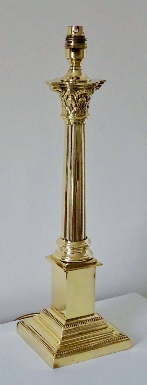 A Tall Brass Corinthian Column Lamp