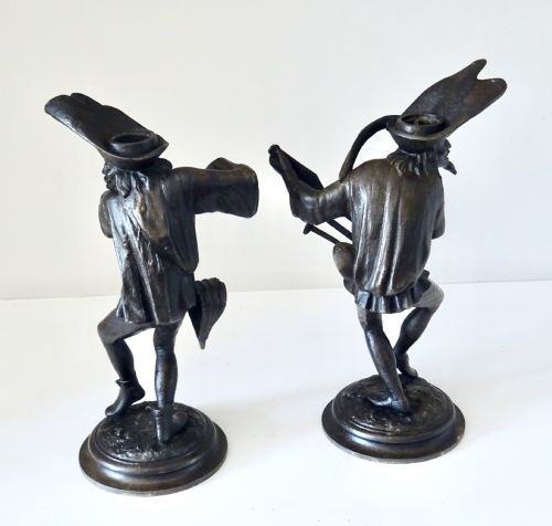 fig 1. PAIR SPELTER GROTESQUE CANDLESTICKS