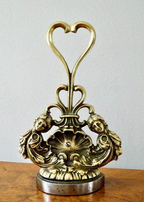 Brass Doorstop with a Shell and Cherubs