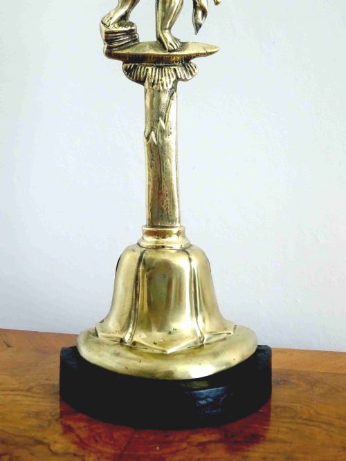C1900 A TALL CHERUB BRASS DOORSTOP - ADDITIONAL PHOTO 2
