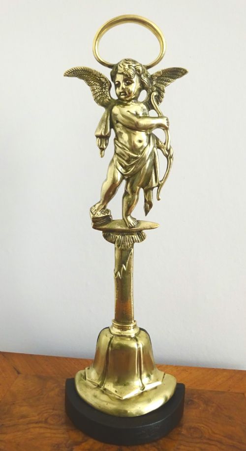 C1900 A TALL CHERUB BRASS DOORSTOP