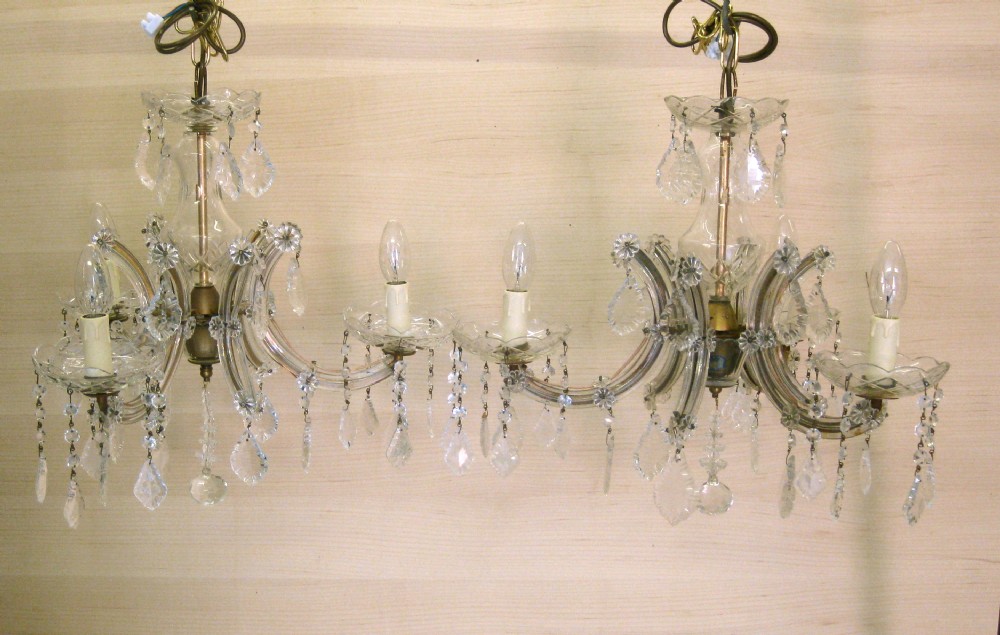 A PAIR OF THREE ARM MARIE THERESE CHANDELIERS