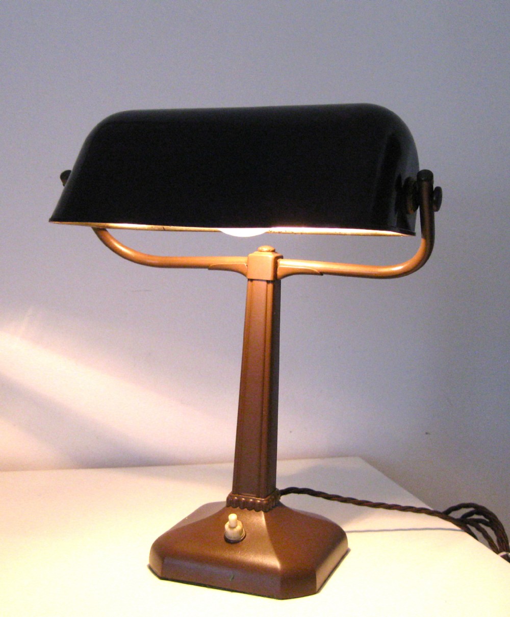 A WAR TIME PAINTED STEEL DESK LAMP