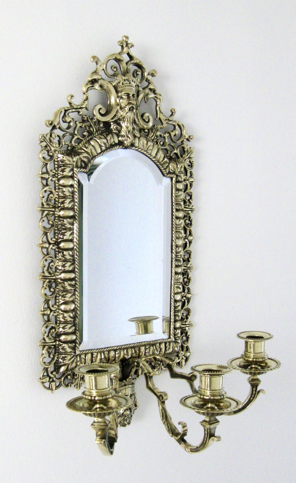 A  BRASS GIRANDOLE MIRROR WITH THE FIGURE OF NEPTUNE