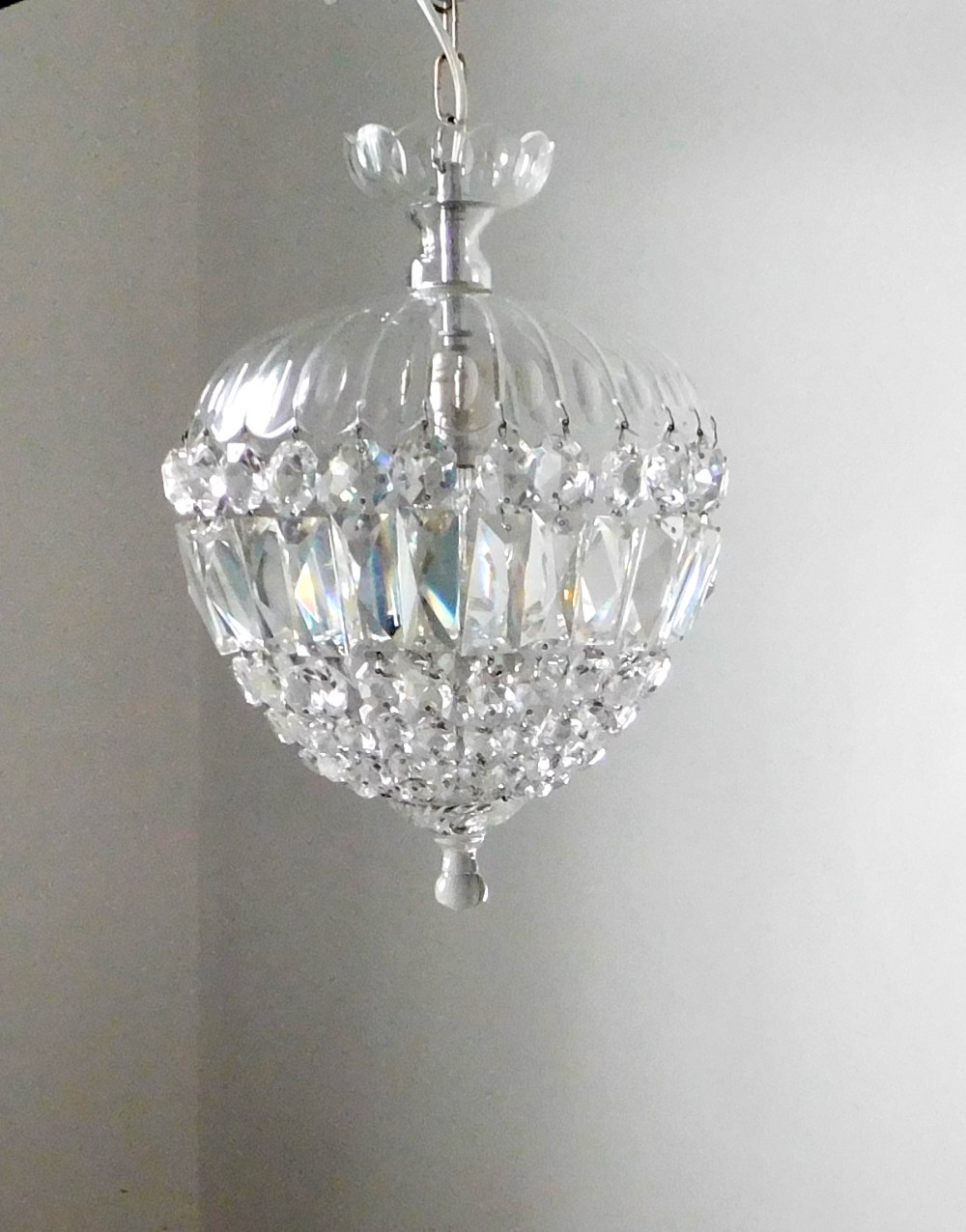 A LARGE GLASS CEILING LIGHT