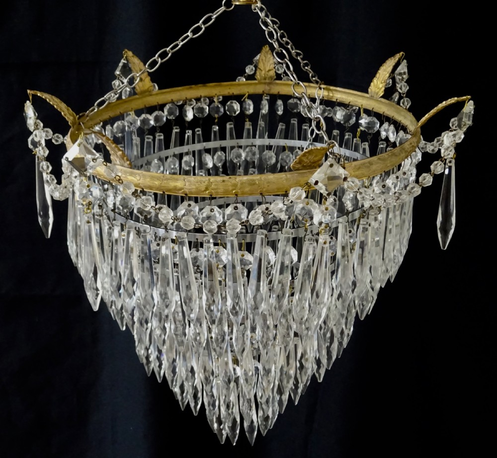 A FIVE TIER GLASS DROP CHANDELIER View II