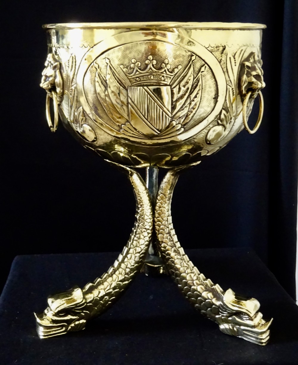 VICTORIAN BRASS JARDINIERE  ON THREE DOLPHIN  FEET