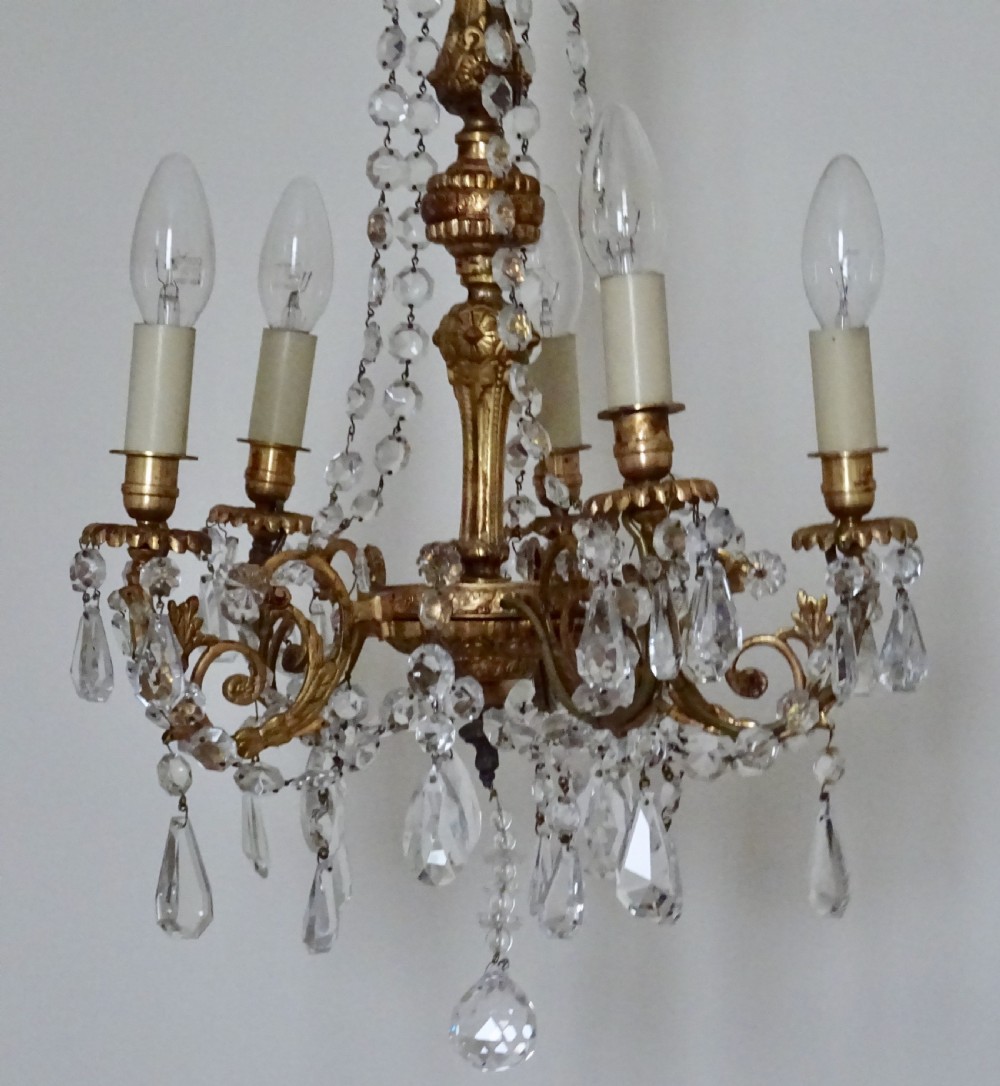FIVE ARM GILDED BRASS CHANDELIER View II