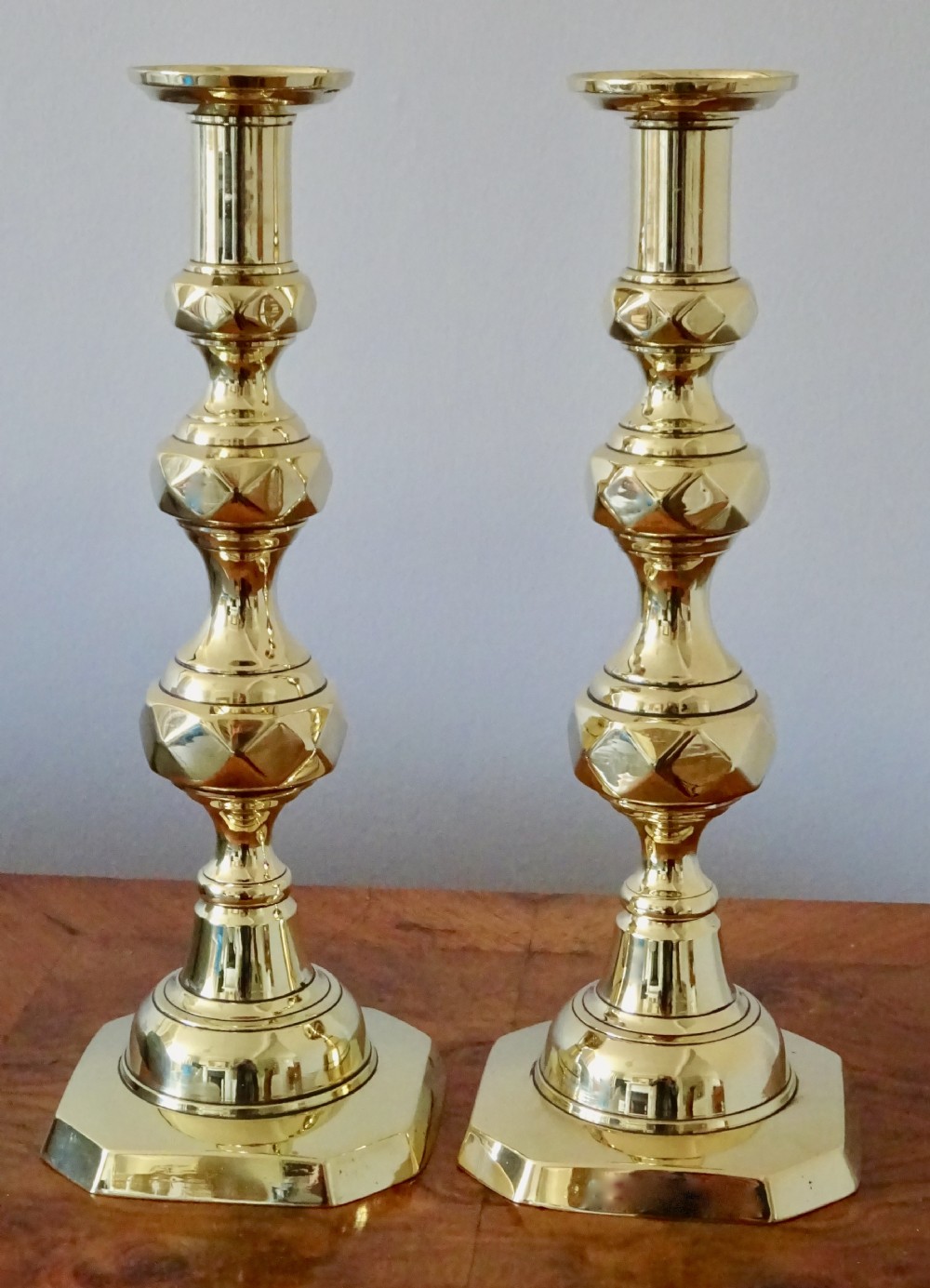 PAIR OF TALL VICTORIAN BRASS CANDLESTICKS