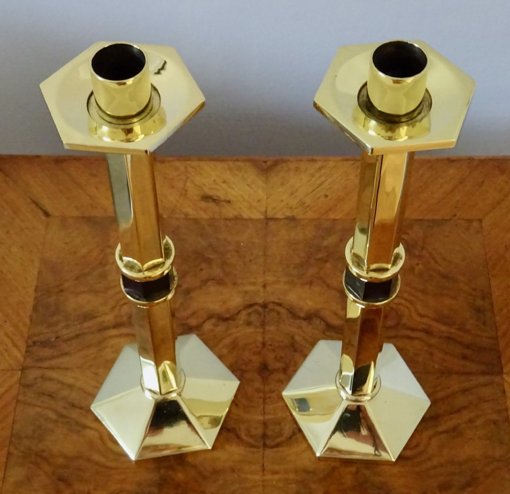 A PAIR OF HEAVY BRASS ART DECO CANDLESTICKS View III
