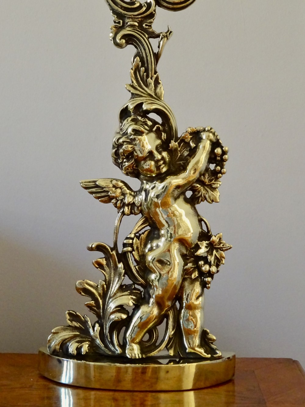 A VICTORIAN BRASS CHERUB DOOR STOP View III