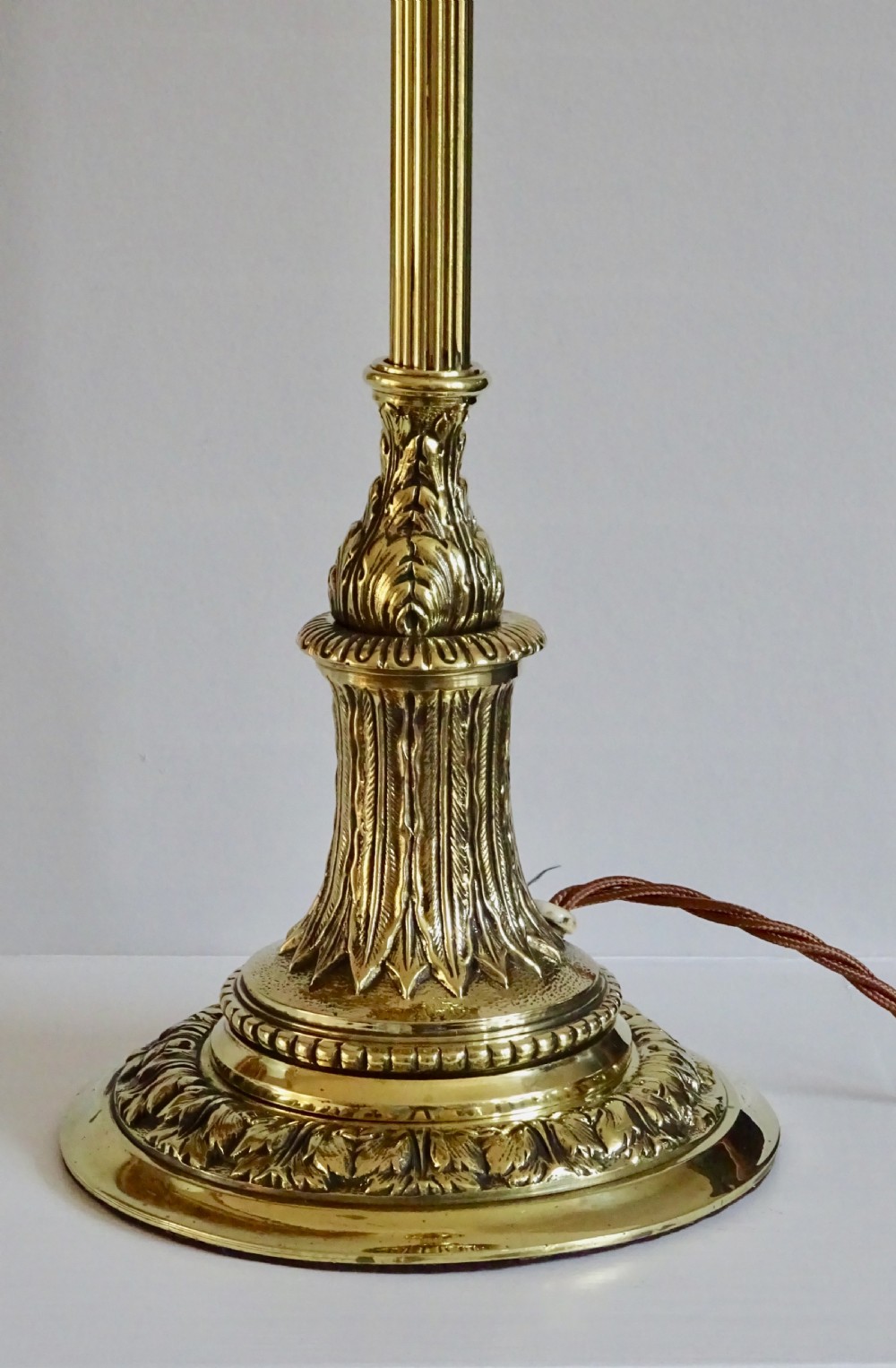 A VICTORIAN BRASS LAMP WITH ORIGINAL WEIGHTED BASE View II