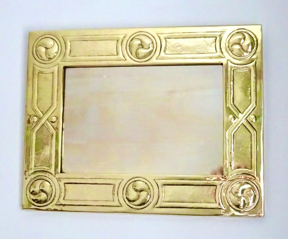 ARTS AND CRAFTS BRASS MIRROR