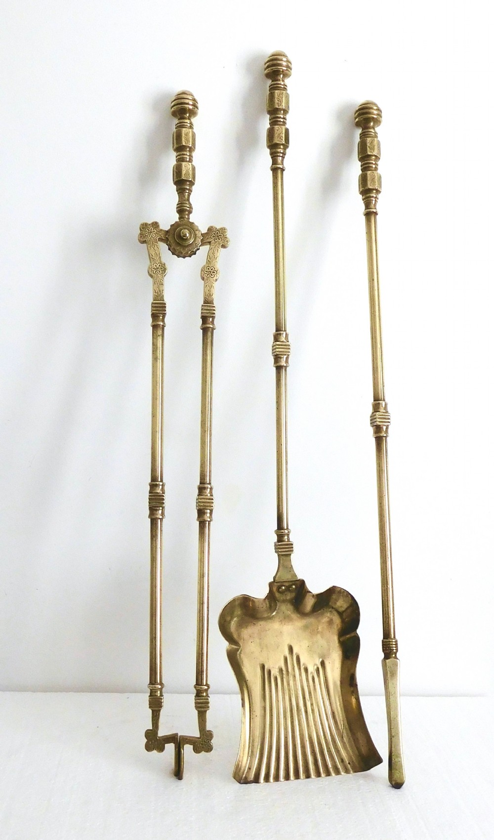 SET OF LONG HANDLE BRASS FIRE IRONS