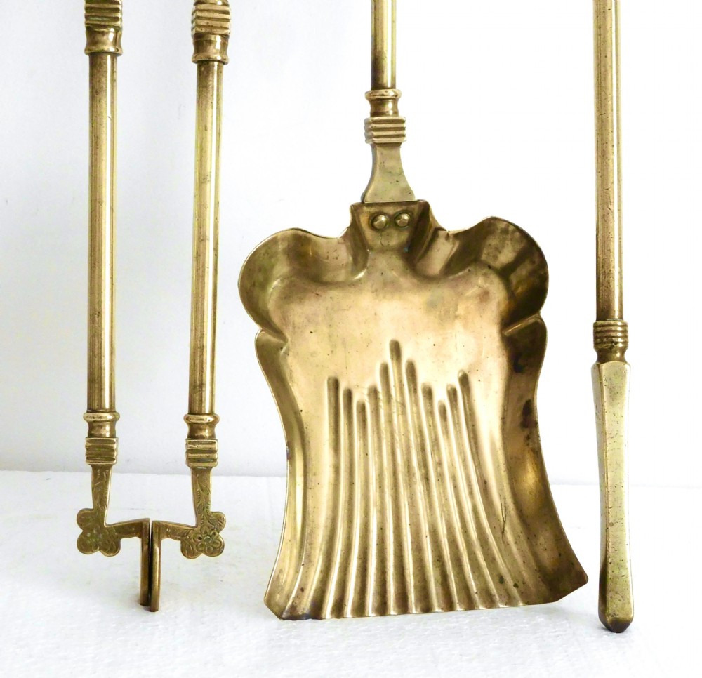 SET OF LONG HANDLE BRASS FIRE IRONS View V