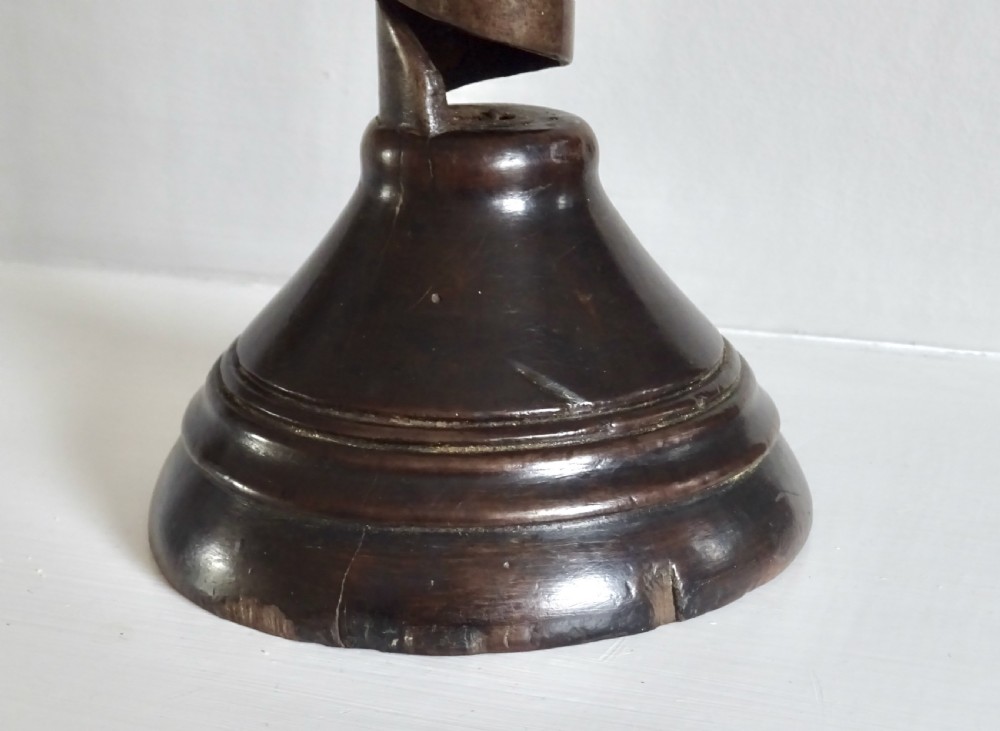 A 19th CENTURY IRON AND WOOD SPIRAL CANDLESTICK View IV