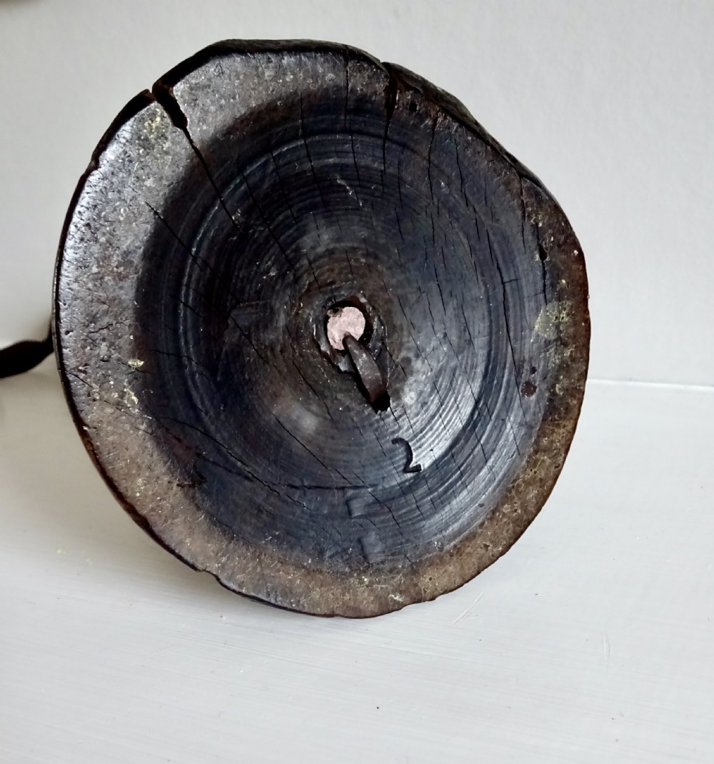 A 19th CENTURY IRON AND WOOD SPIRAL CANDLESTICK View V