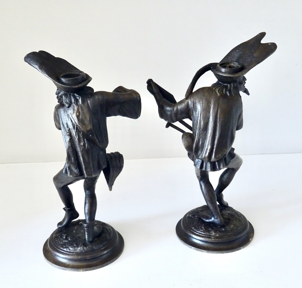 PAIR SPELTER GROTESQUE CANDLESTICKS View II
