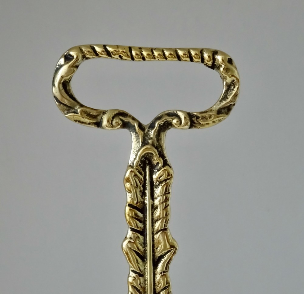 VICTORIAN BRASS LION'S FOOT DOORSTOP View II
