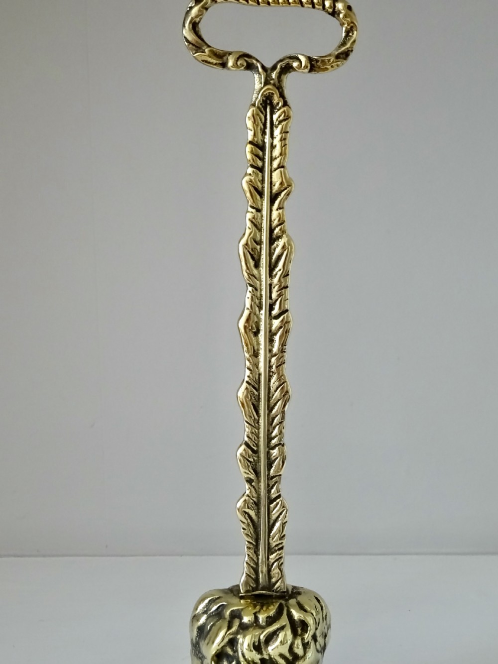 VICTORIAN BRASS LION'S FOOT DOORSTOP View IV