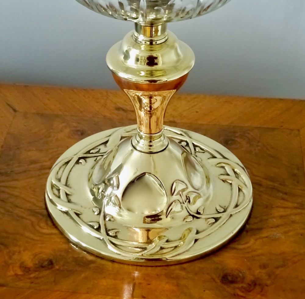 A BRASS, COPPER AND GLASS OIL LAMP View II