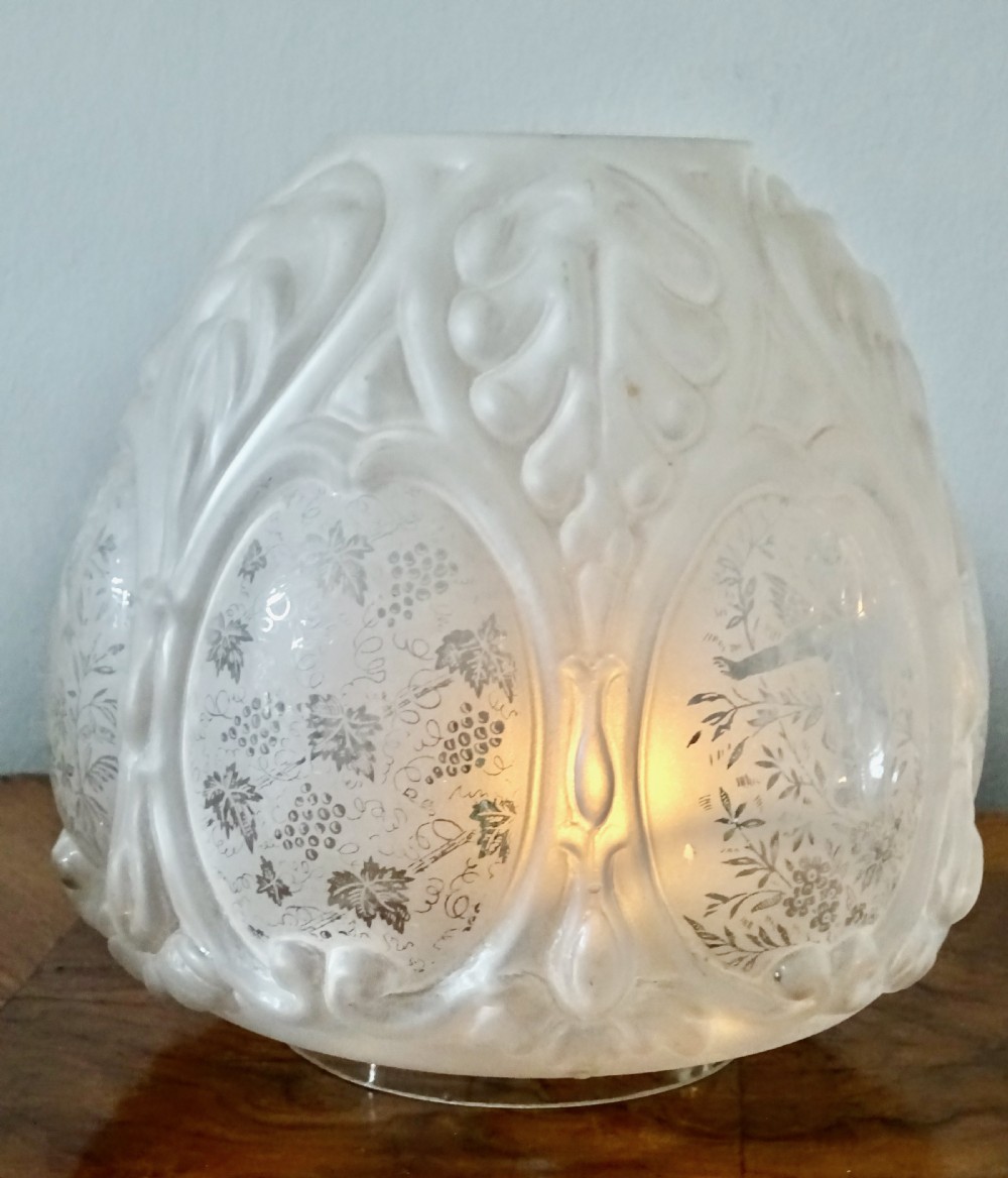 A BRASS, COPPER AND GLASS OIL LAMP View V