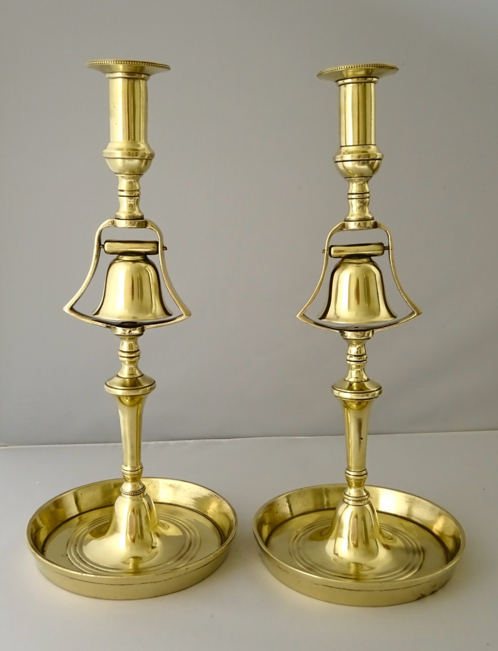 PAIR BRASS TAVERN CANDLESTICKS WITH BELLS View II