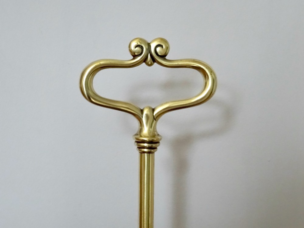 TALL BRASS DOORSTOP BY WILLIAM TONKS  View VI