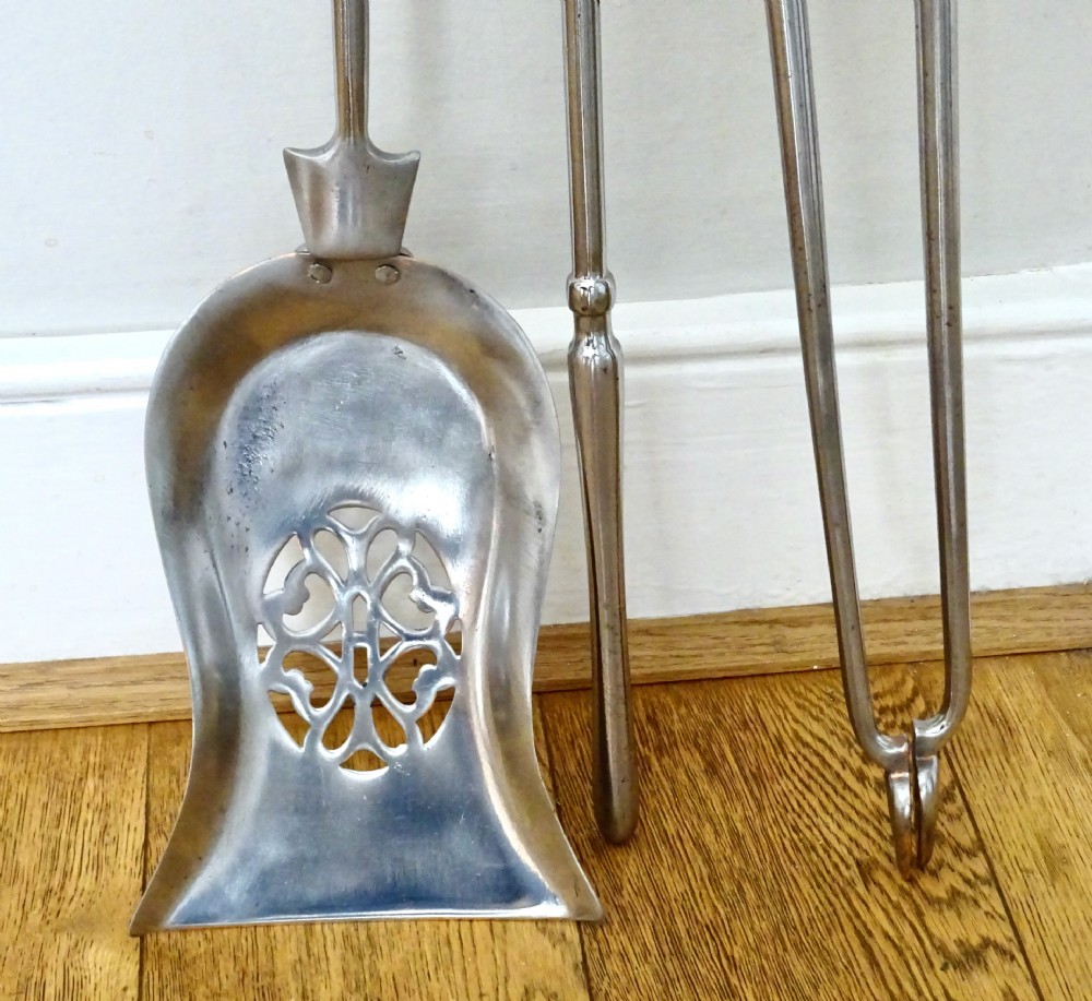 SET OF POLISHED STEEL FIRE IRONS View VIII